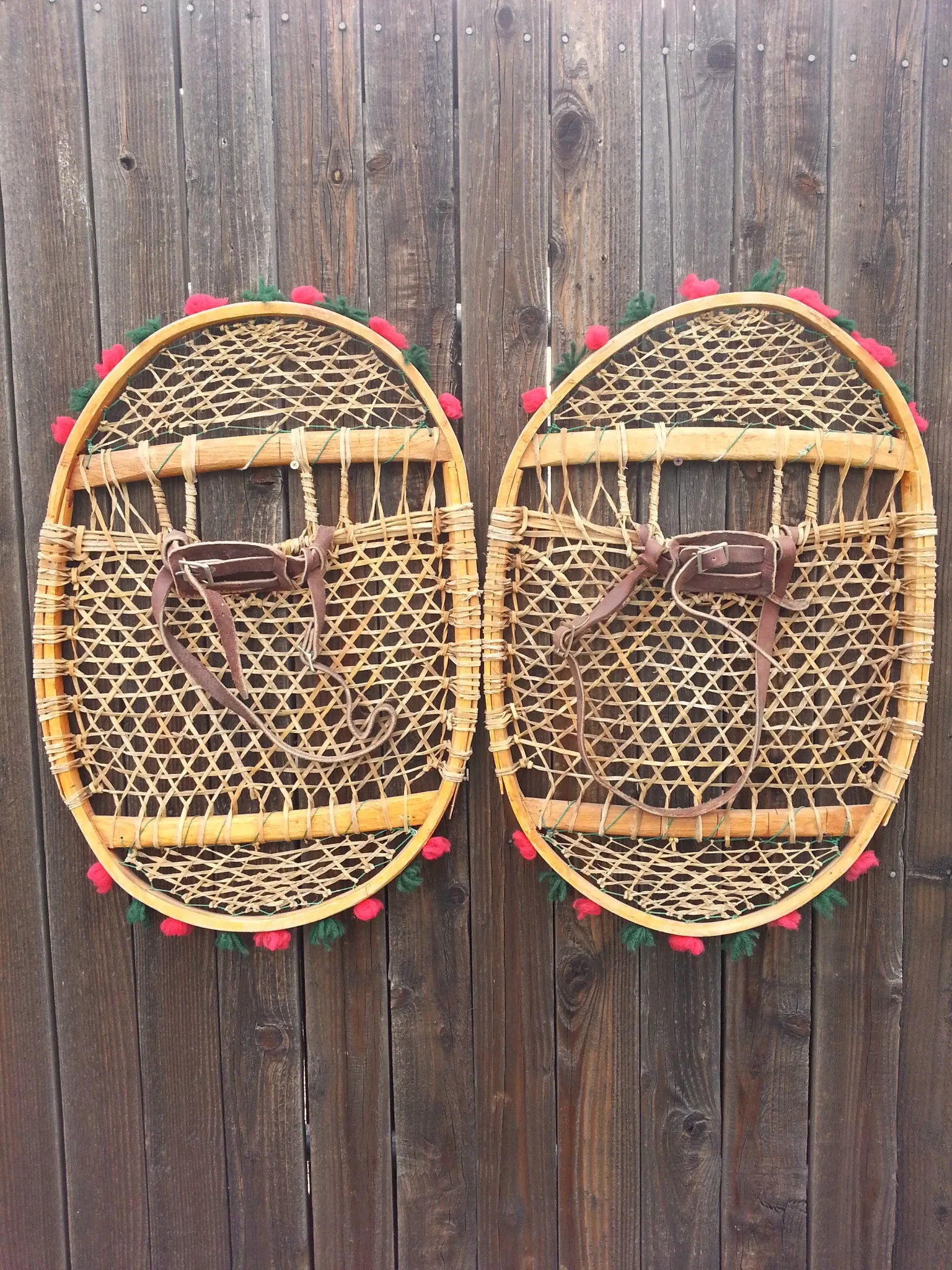 Antique Native American Snowshoes with pom poms