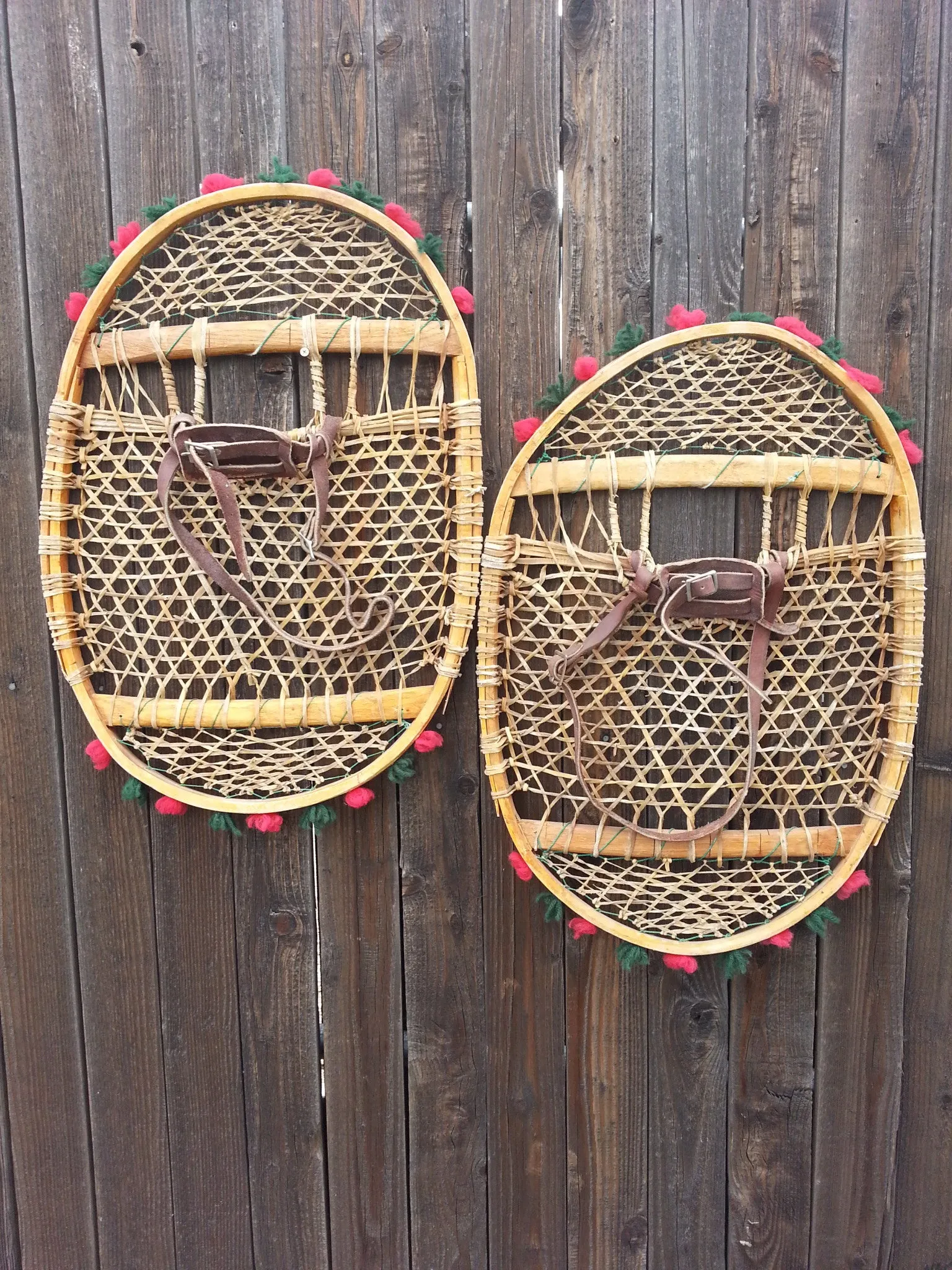 Antique Native American Snowshoes with pom poms